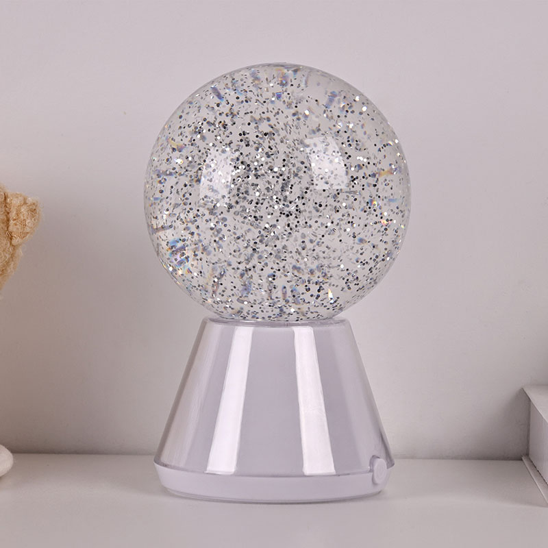 Luce notturna con glitter liquidi che cambiano colore